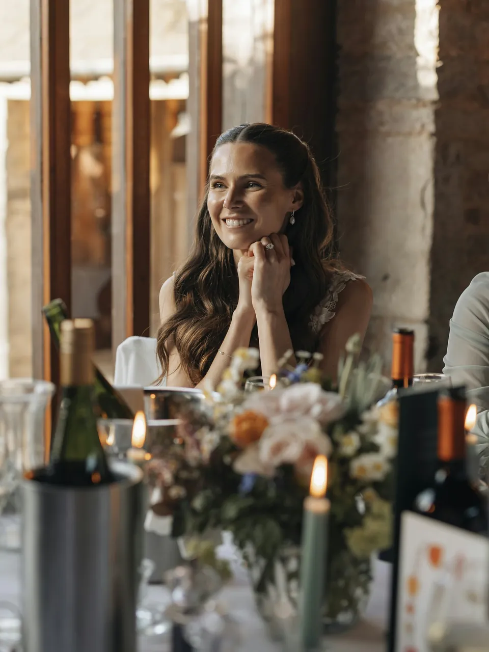 A guest laughing at her table